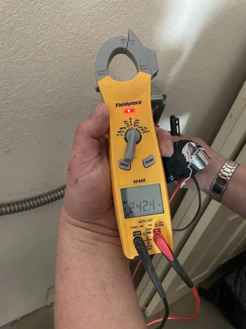 Voltage testing with clamp meter during Recessed Lighting Installation in Pepper Pike